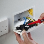 Electrical socket outlet being replaced